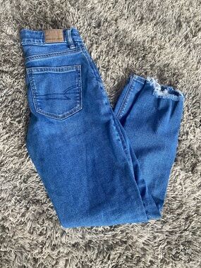 American Eagle Outfitters Mid-Blue Straight Leg Jeans with Frayed Hem